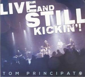 Live and still kickin' (cd + dvd)