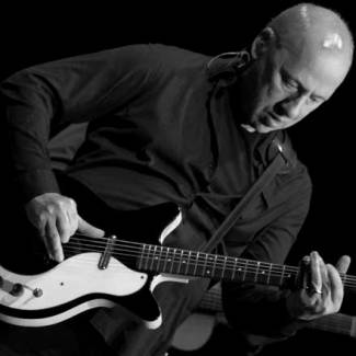 Mark Knopfler - Muzikale eenvoud loont altijd